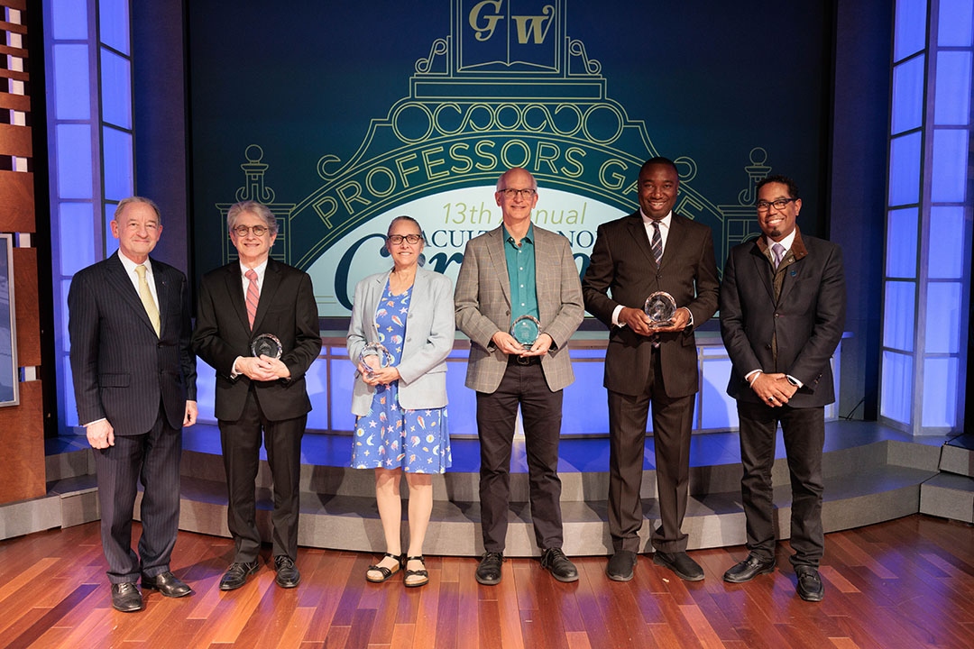 From left, Former President Wrighton with Trachtenberg Prize winners Paul Duff, Kim Roddis, David DeGrazia and Ekundayo Shittu; and Provost Bracey.