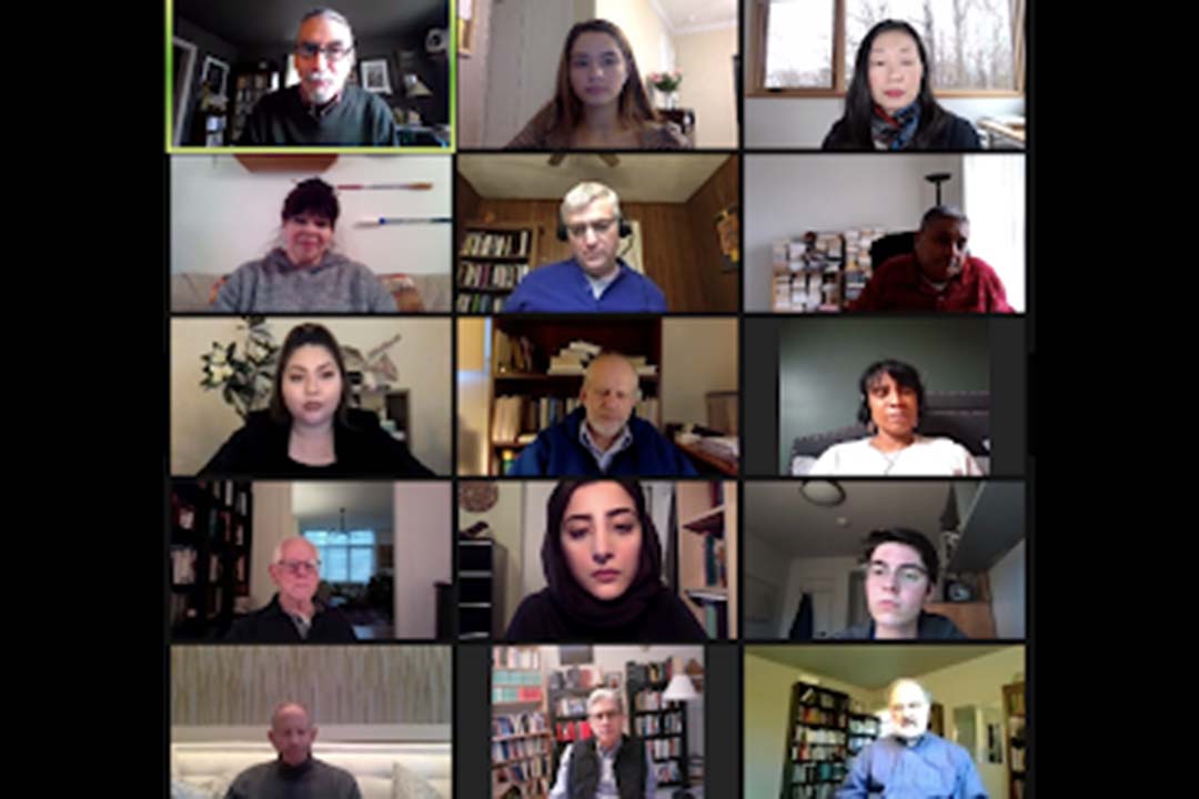 Rows of people on a Zoom screen listening to a lecture